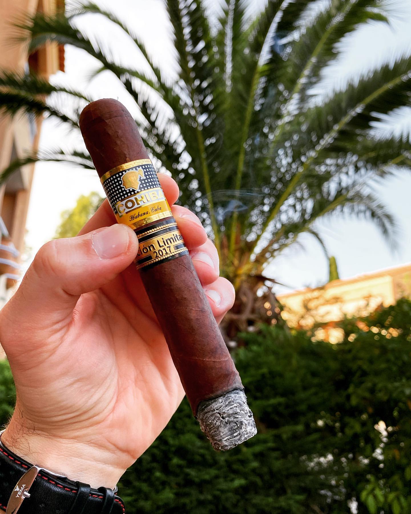 Customer enjoying authentic Cuban cigars